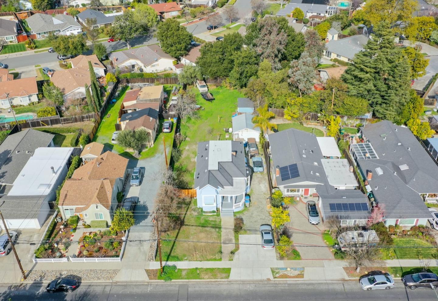 5121 Bucknall Road San Jose, CA 95130 - Photo 1 of 26 an aerial view of residential houses with outdoor space