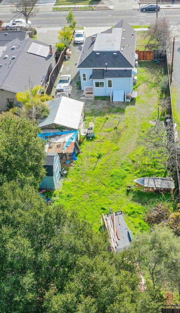 5121 Bucknall Road San Jose, CA 95130 - Photo 12 of 26 a view of a house with a yard