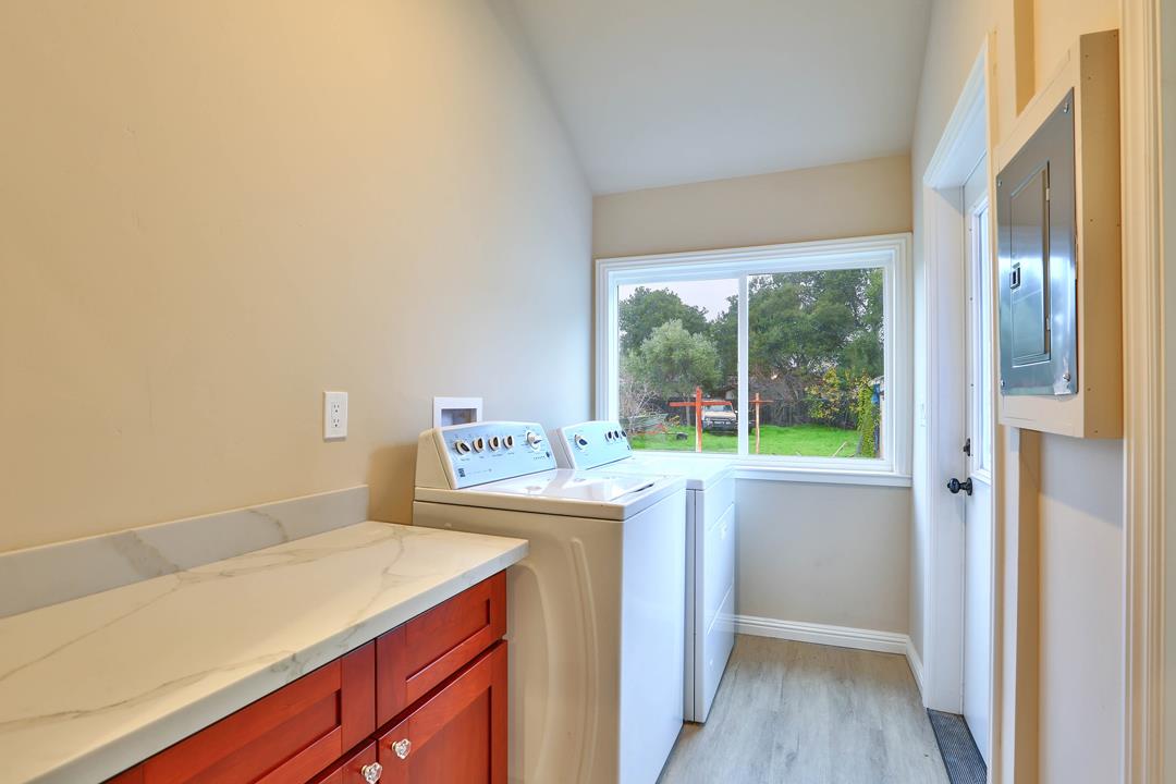 5121 Bucknall Road San Jose, CA 95130 - Photo 21 of 26 a room with a sink and a vanity