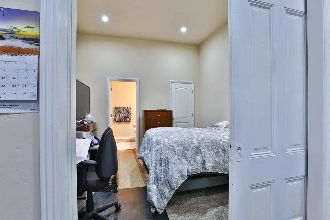 5121 Bucknall Road San Jose, CA 95130 - Photo 26 of 26 a bedroom with a bed and wooden floor