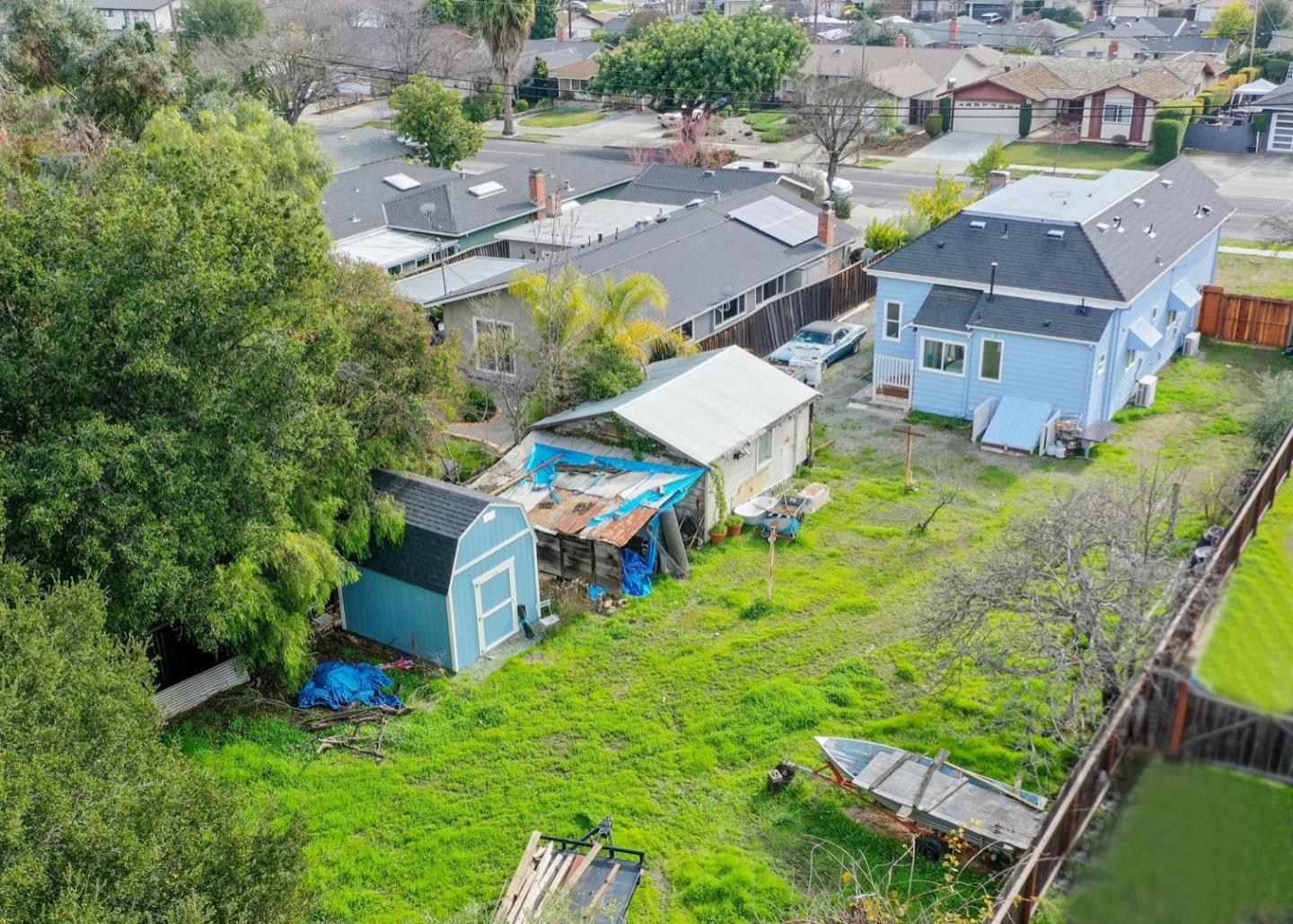 5121 Bucknall Road San Jose, CA 95130 - Photo 3 of 26 an aerial view of a house with a garden