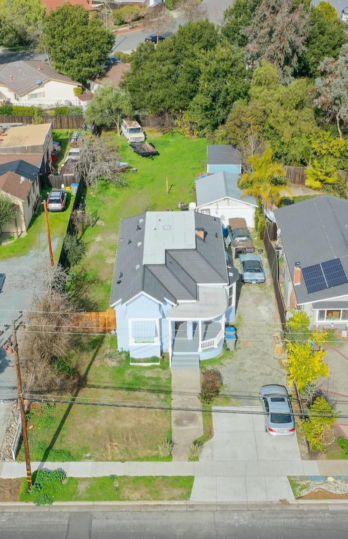 5121 Bucknall Road San Jose, CA 95130 - Photo 4 of 26 an aerial view of a house with a yard basket ball court and outdoor seating