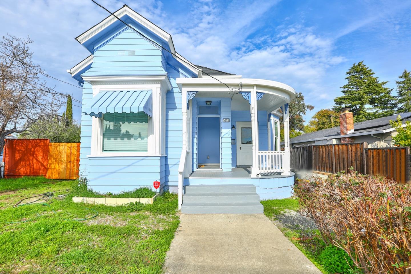 5121 Bucknall Road San Jose, CA 95130 - Photo 6 of 26 a front view of a house with garden