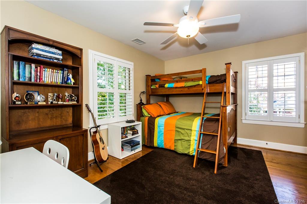 2307 Overhill Road Charlotte, NC 28211 - Photo 14 of 24 a bedroom with bunk bed and a window
