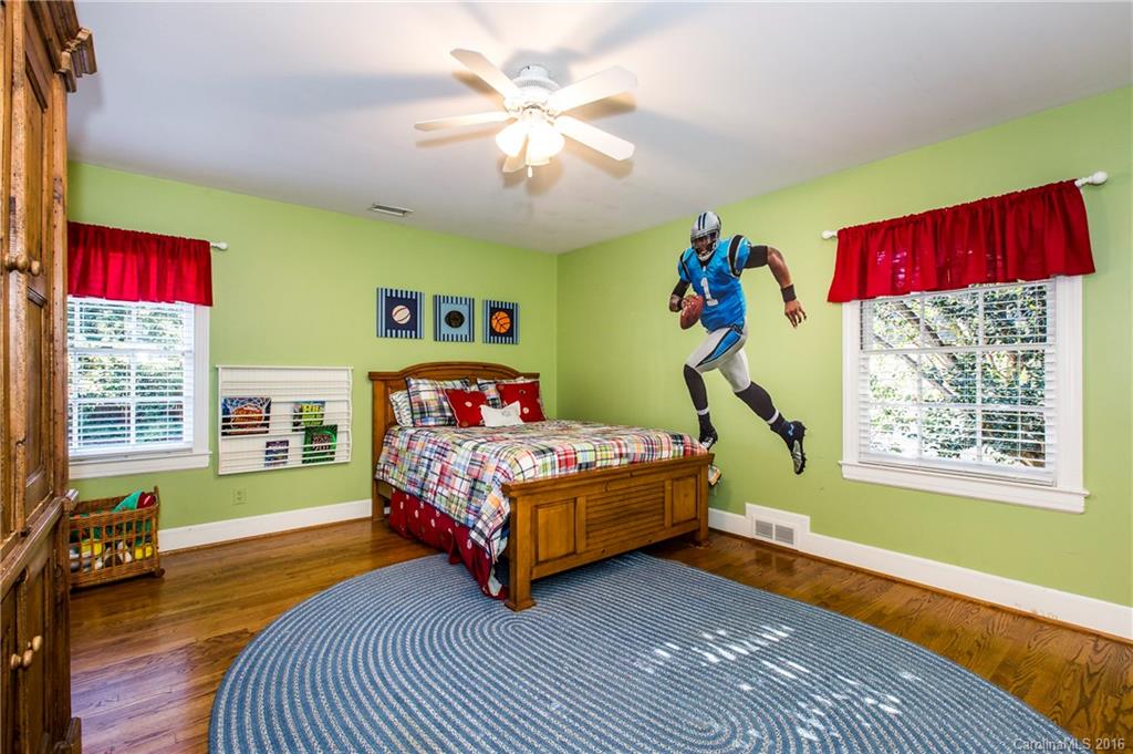 2307 Overhill Road Charlotte, NC 28211 - Photo 16 of 24 a bedroom with a bed and a window