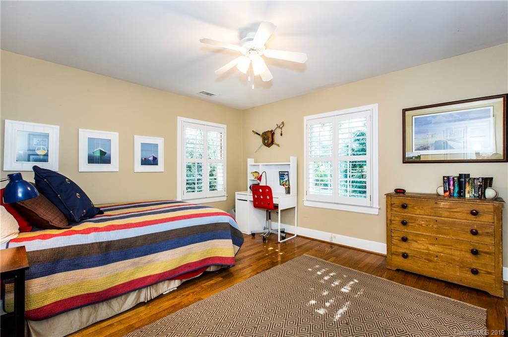 2307 Overhill Road Charlotte, NC 28211 - Photo 17 of 24 a bedroom with furniture and a window
