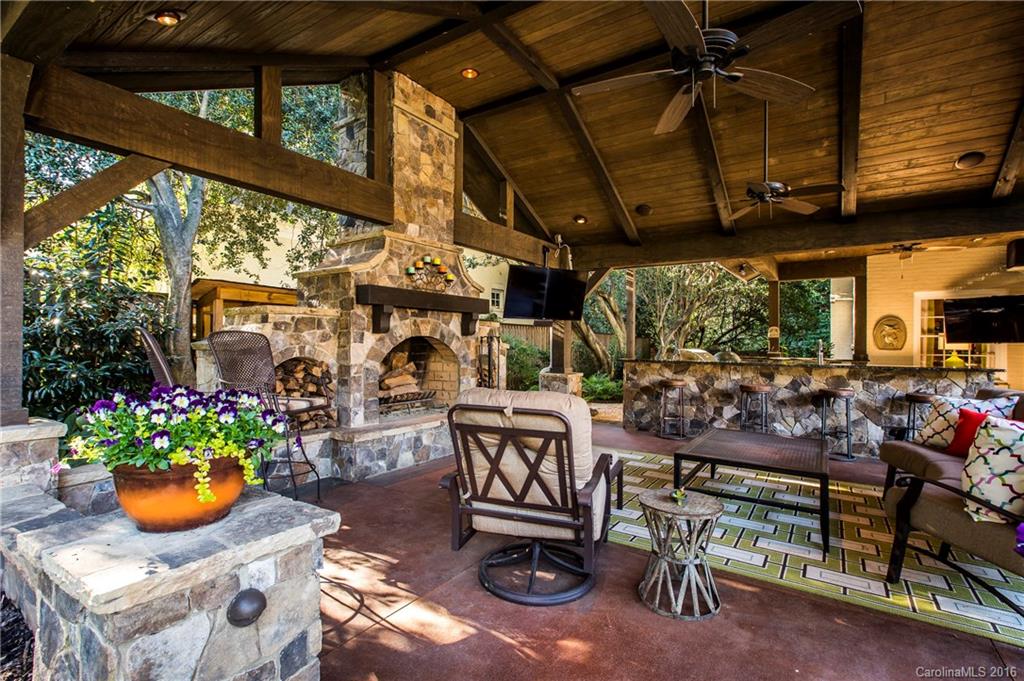2307 Overhill Road Charlotte, NC 28211 - Photo 18 of 24 a view of a chairs and tables in patio