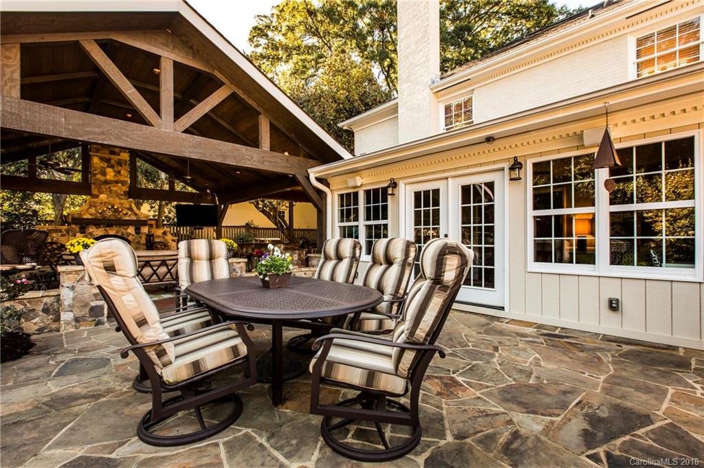 2307 Overhill Road Charlotte, NC 28211 - Photo 20 of 24 a view of a chairs and table in patio