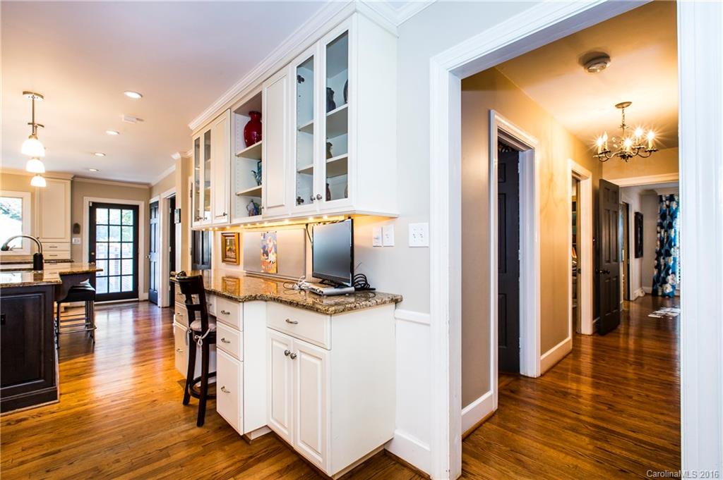 2307 Overhill Road Charlotte, NC 28211 - Photo 5 of 24 a view of a living room with furniture and wooden floor