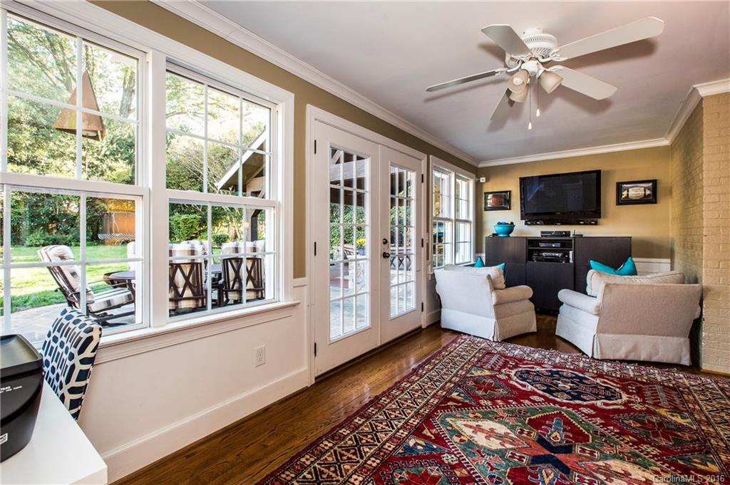 2307 Overhill Road Charlotte, NC 28211 - Photo 8 of 24 a living room with furniture fireplace and a large window