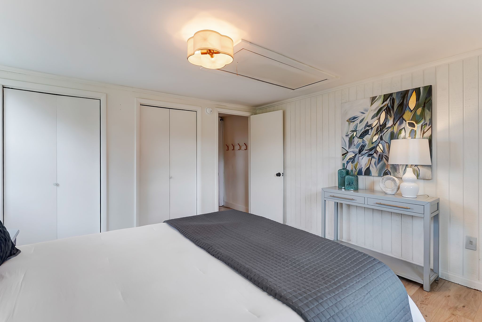 6212 Arno Road Franklin, TN 37064 - Photo 10 of 21 a bedroom with a bed and a chandelier