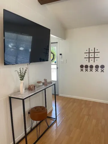 a room with a table and chairs