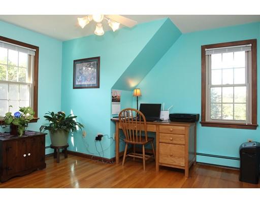 28 McGuire Road Sutton, MA 01590 - Photo 17 of 30 a workspace with furniture and a potted plant