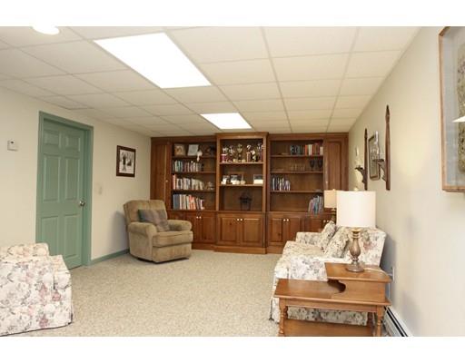 28 McGuire Road Sutton, MA 01590 - Photo 23 of 30 a living room with furniture and white walls