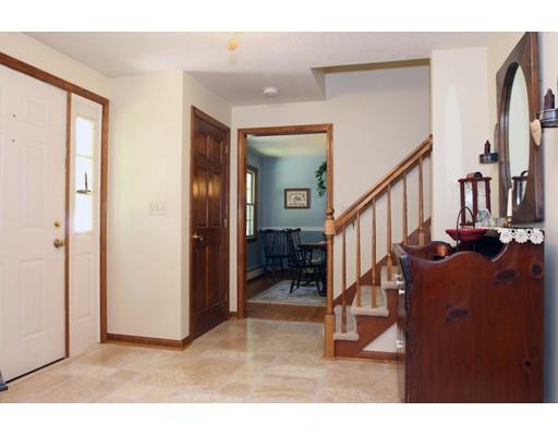 28 McGuire Road Sutton, MA 01590 - Photo 5 of 30 a view interior of a house and an entryway with wooden floor