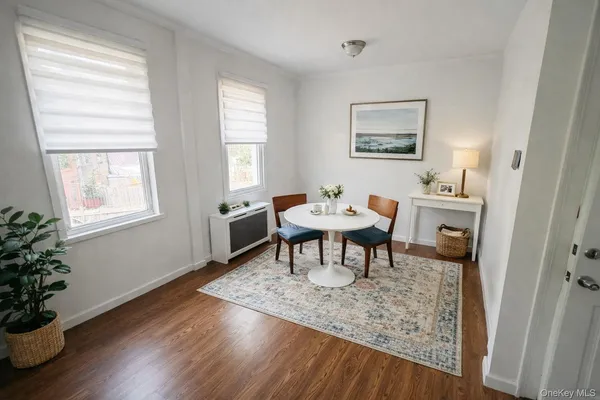 a work room with furniture and wooden floor