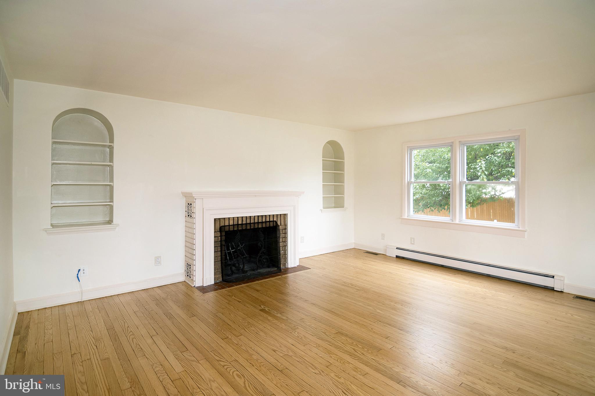 920 South Spring Road Vineland, NJ 08361 - Photo 8 of 50 Living room with wood burning fireplace