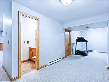 a kitchen with a sink and a refrigerator