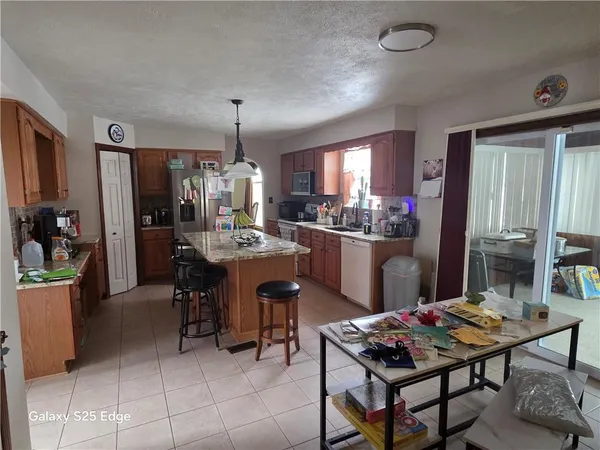 a view of livingroom with furniture and wooden floor