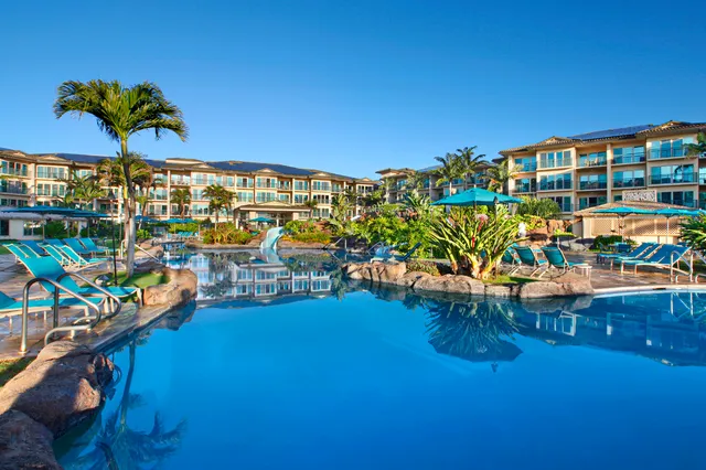 a view of swimming pool with outdoor seating