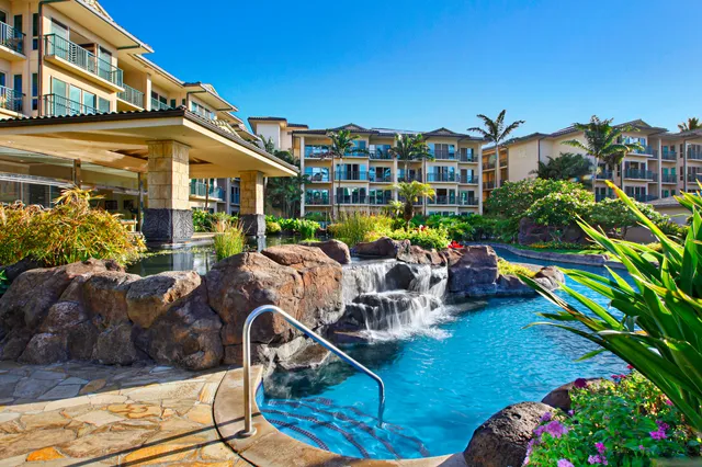 a view of a chairs and table in a patio