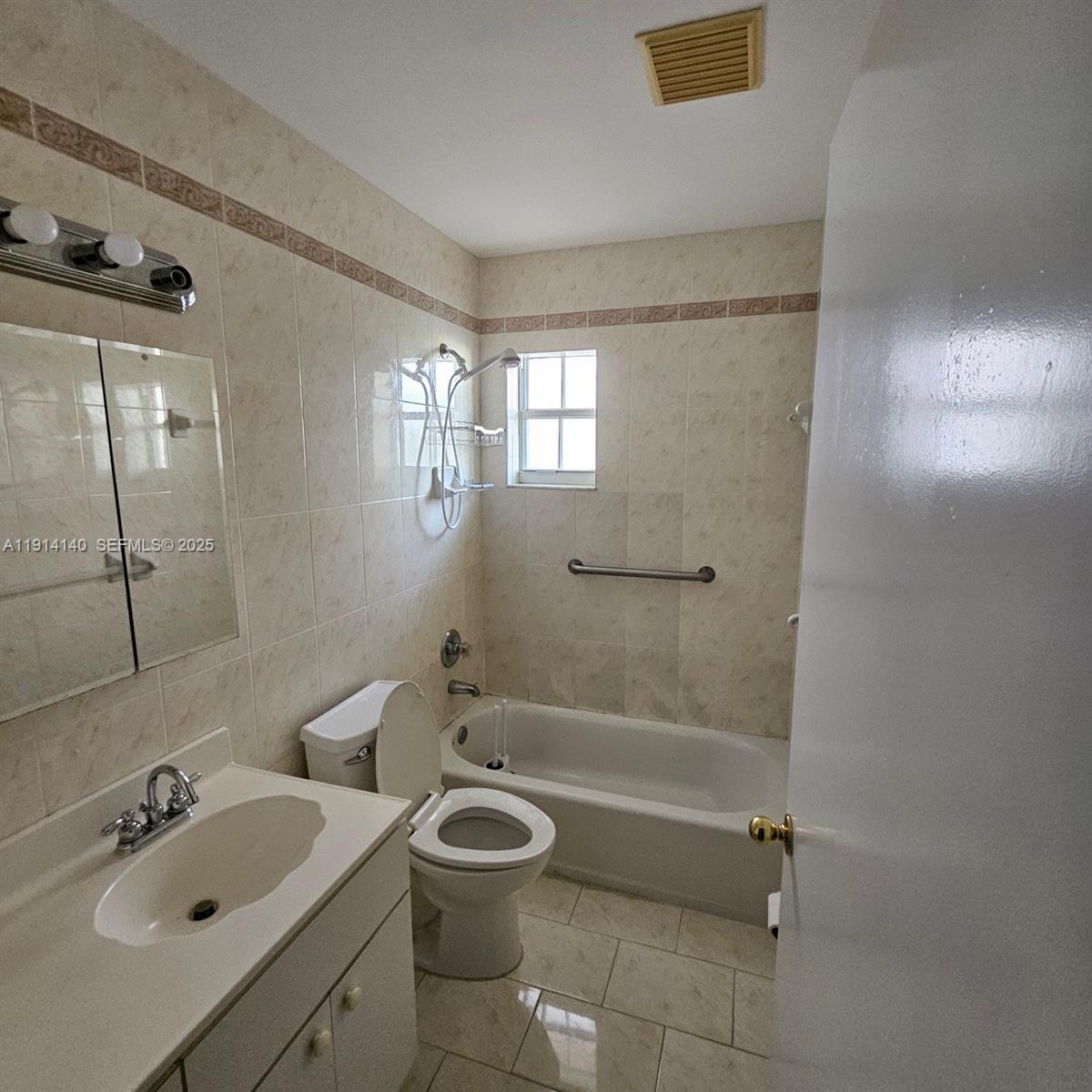 8330 Southwest 96th Place Miami, FL 33173 - Photo 24 of 28 a bathroom with a sink toilet and shower