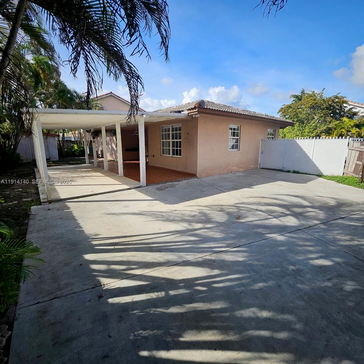8330 Southwest 96th Place Miami, FL 33173 - Photo 25 of 28 a view of a house with a patio