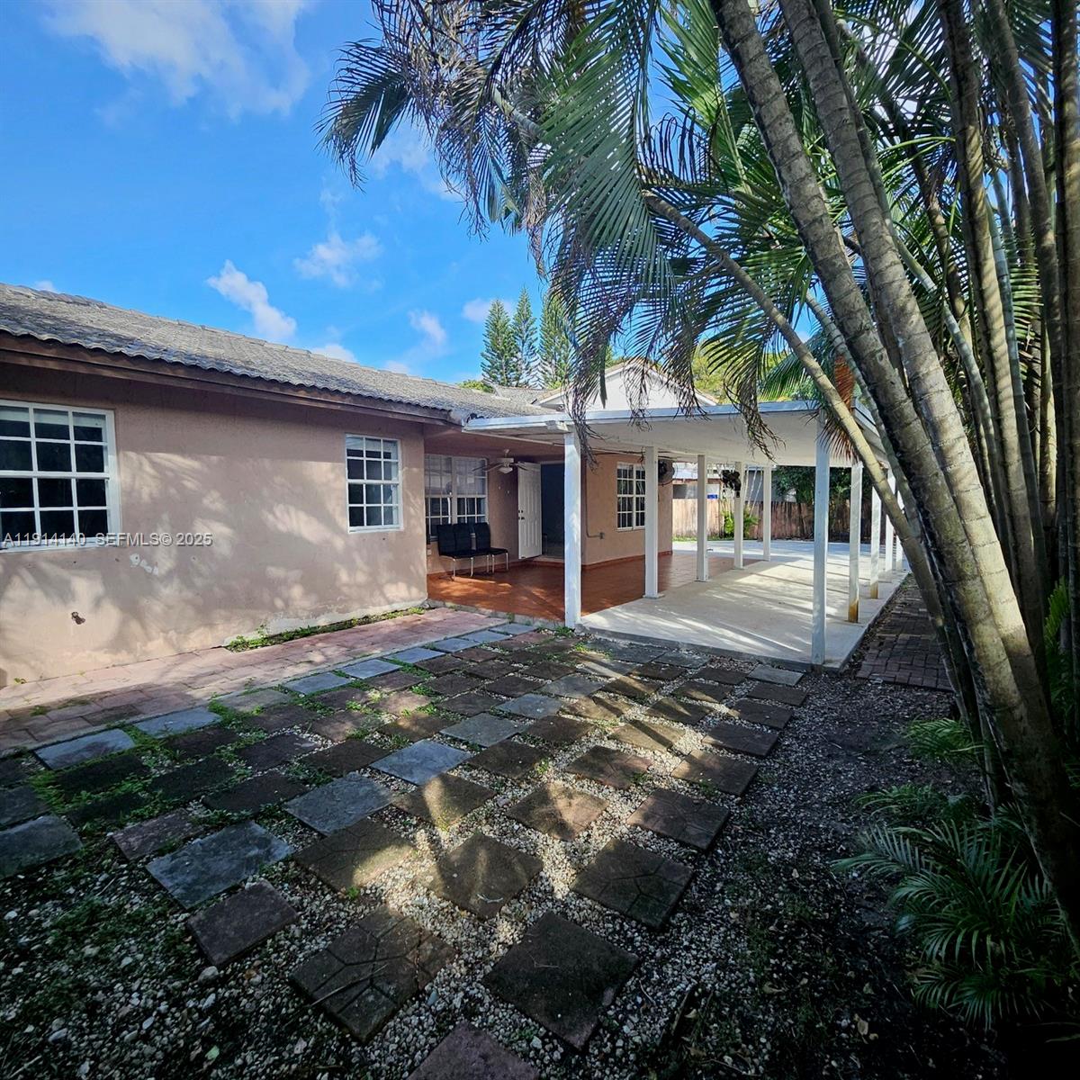 8330 Southwest 96th Place Miami, FL 33173 - Photo 27 of 28 a view of a house with a yard