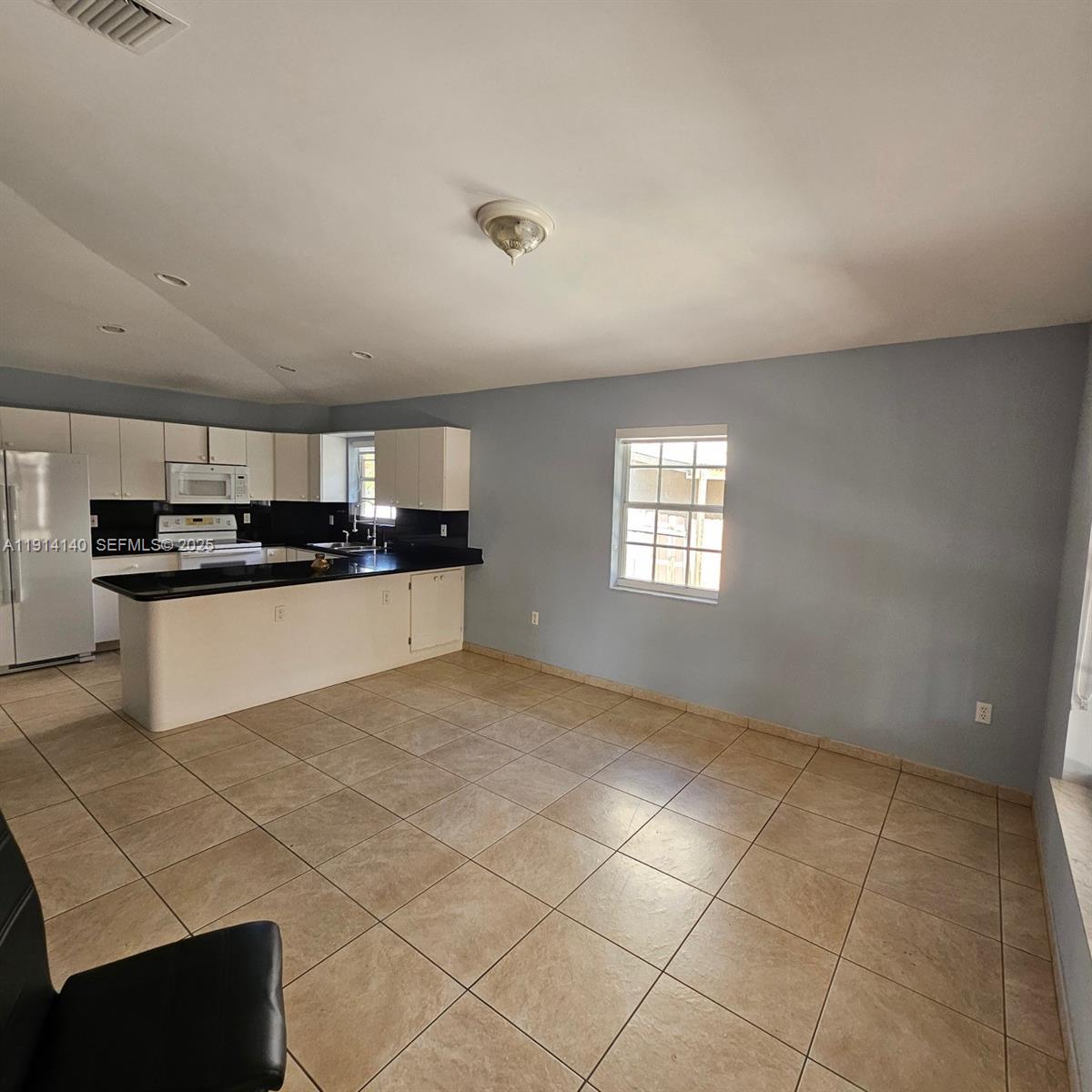 8330 Southwest 96th Place Miami, FL 33173 - Photo 10 of 28 a view of a kitchen with a sink