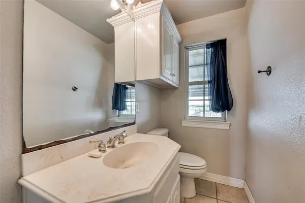 a bathroom with a sink and a toilet