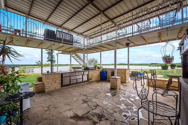 a view of a swimming pool with a patio