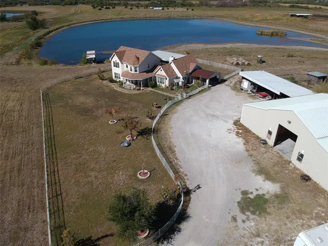 an aerial view of a highlighted house