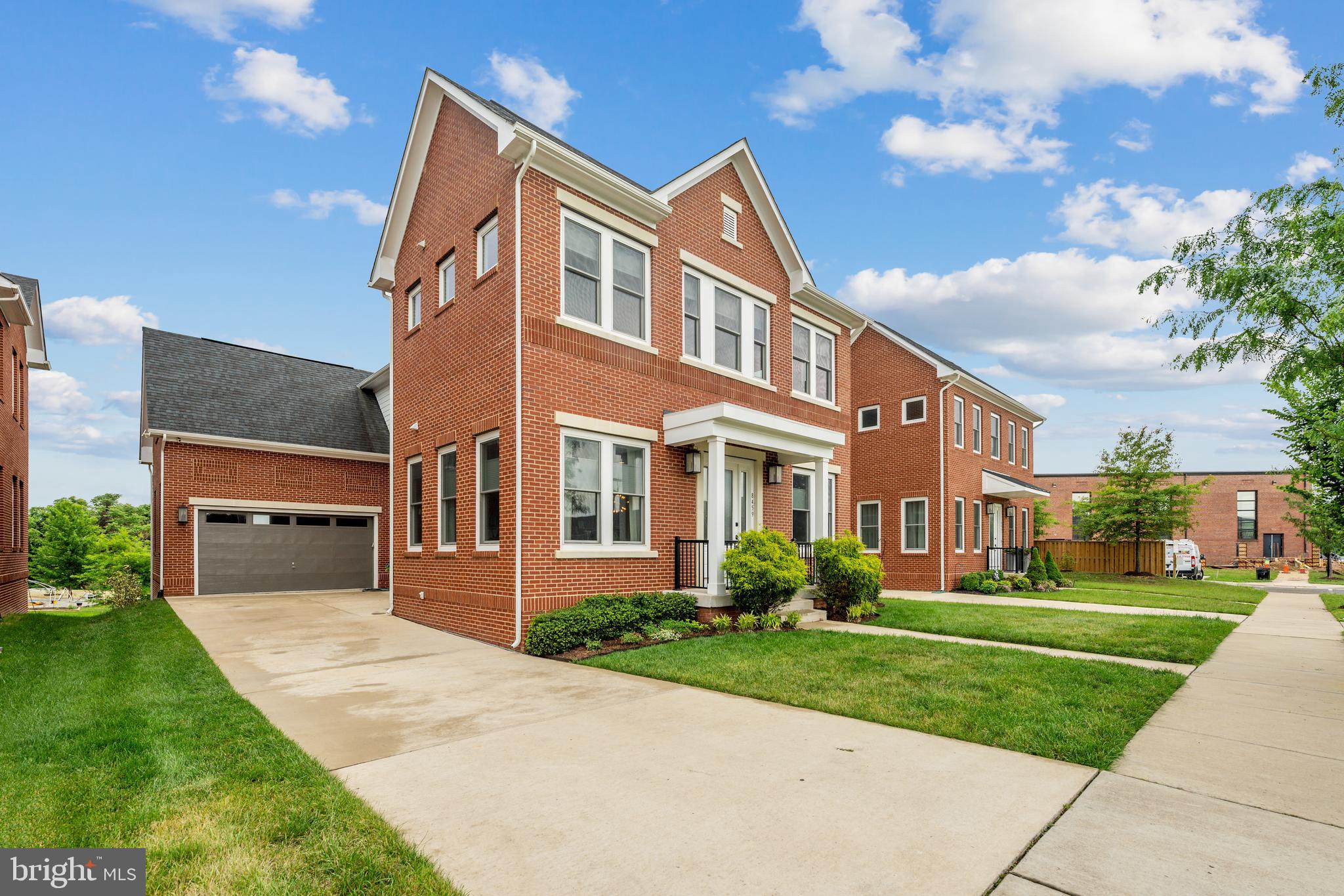 8459 Reformatory Way Lorton, VA 22079 - Photo 59 of 78 a front view of a house with a yard
