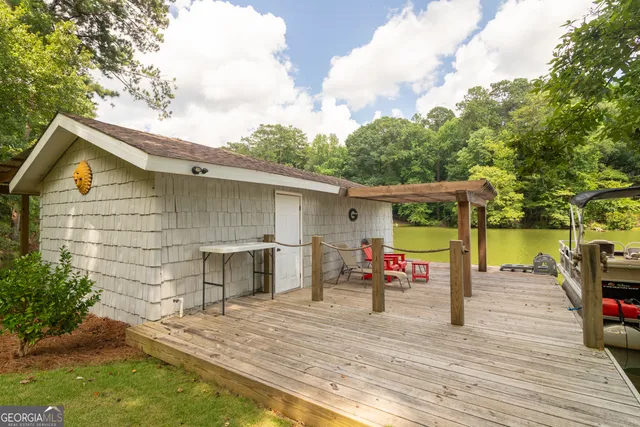 a room with furniture and wooden floor