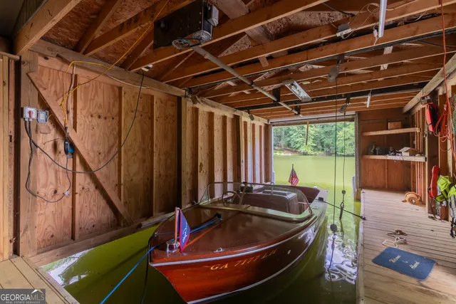 a view of swimming pool with outdoor seating