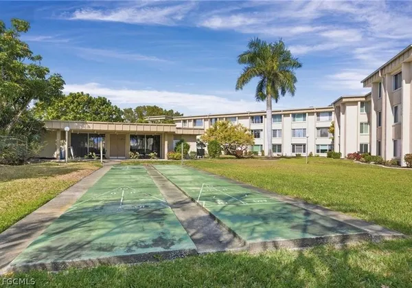 a view of a swimming pool with a patio