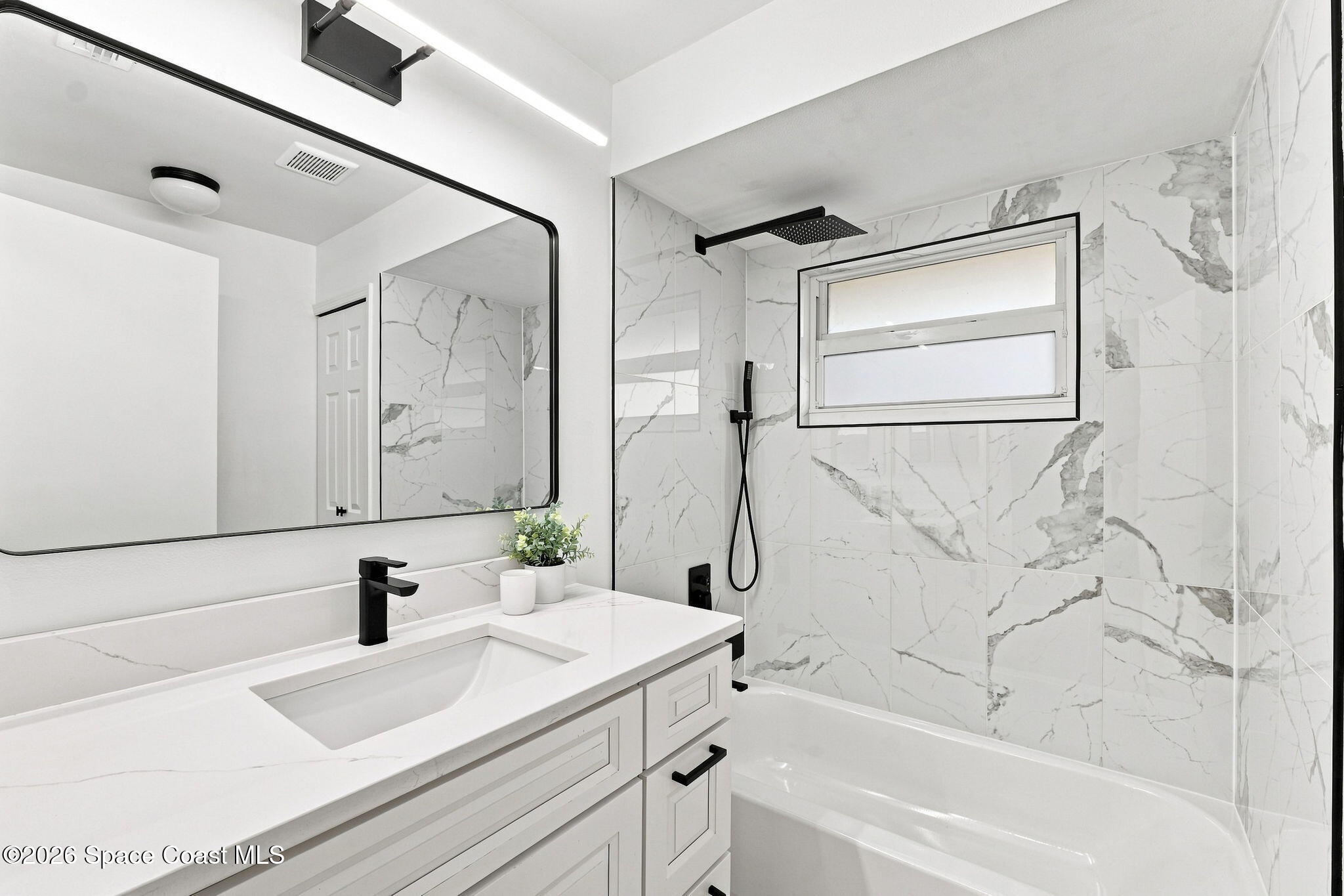 846 Raintree Avenue Rockledge, FL 32955 - Photo 15 of 28 Hall Bathroom