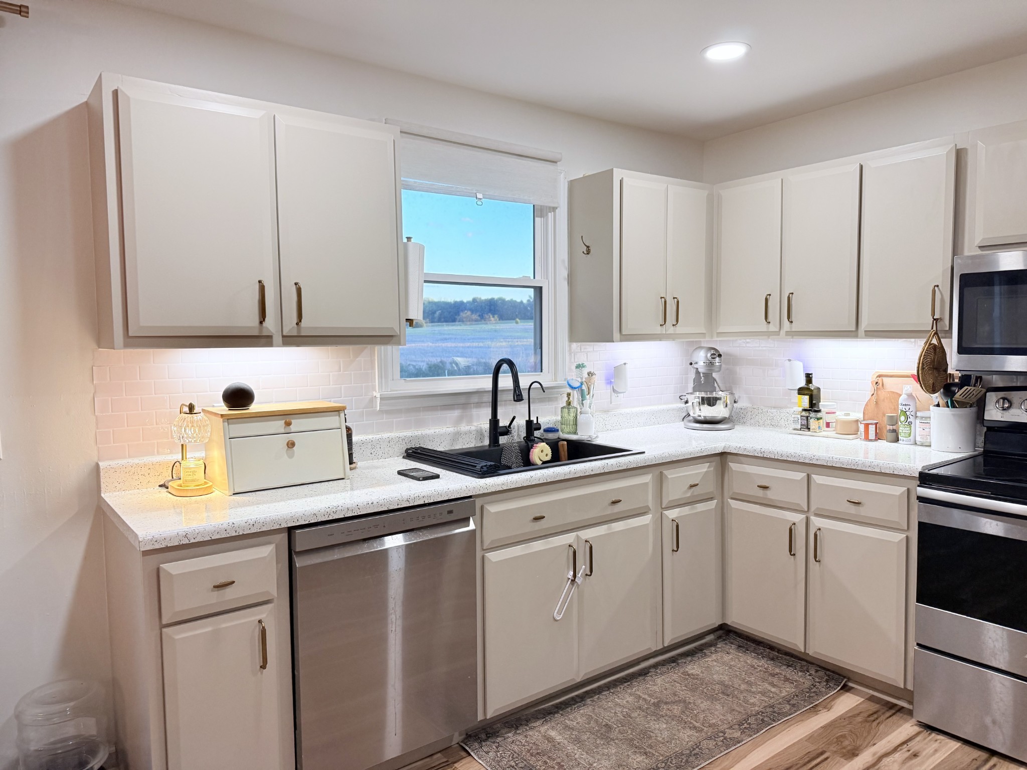 6023 Wayman Dunn Road Springfield, TN 37172 - Photo 14 of 38 a kitchen with cabinets appliances a sink and a counter top space