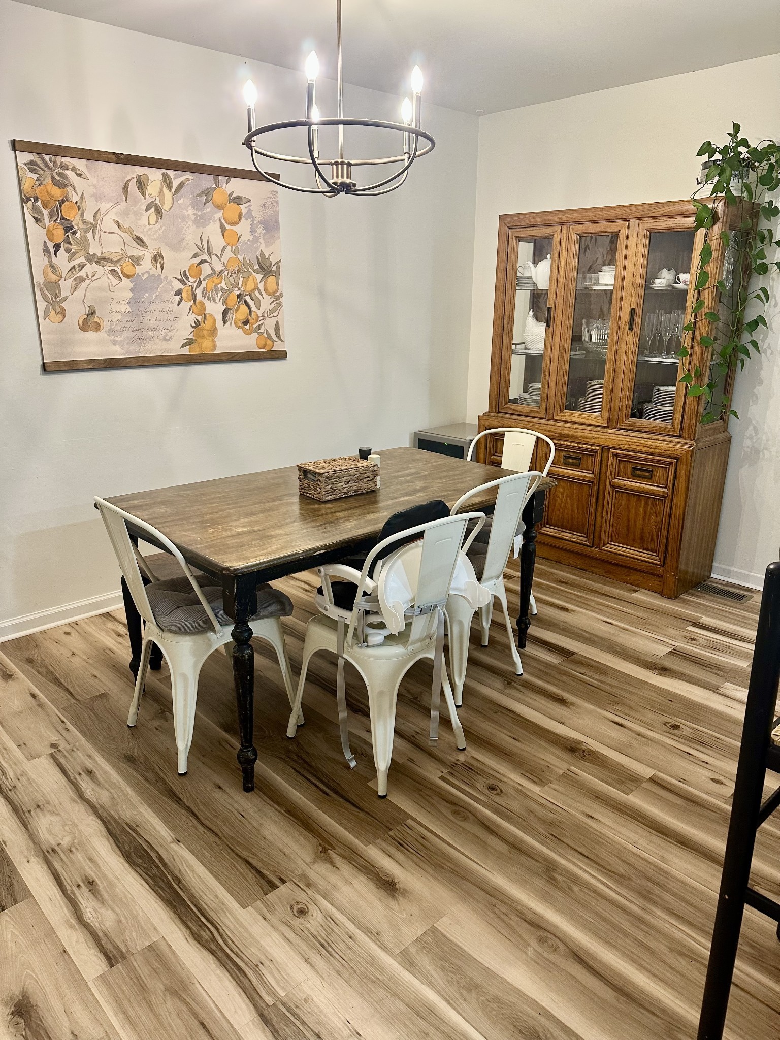 6023 Wayman Dunn Road Springfield, TN 37172 - Photo 20 of 38 a view of a dining room with furniture a chandelier and wooden floor