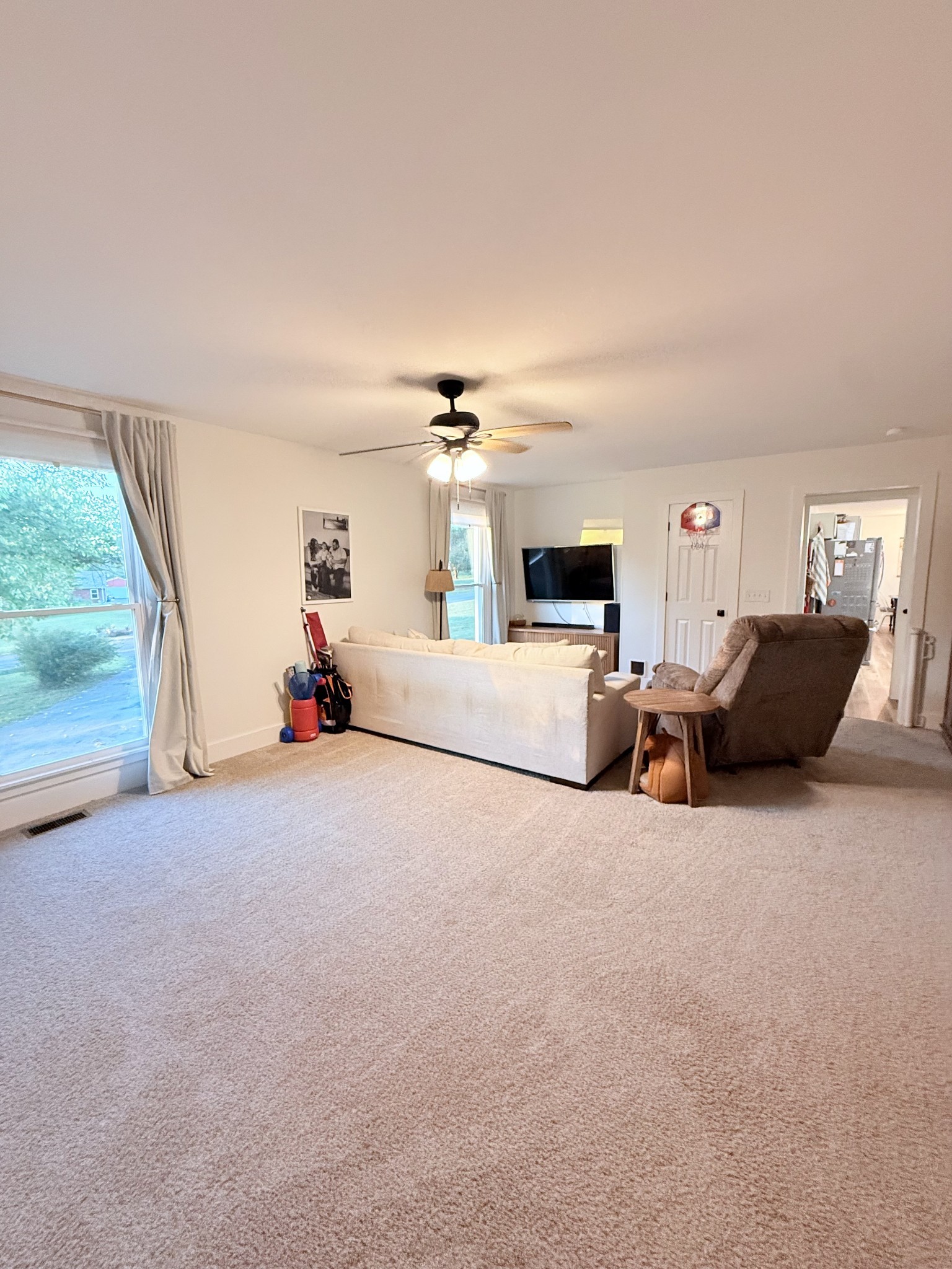 6023 Wayman Dunn Road Springfield, TN 37172 - Photo 25 of 38 a bed room with furniture and a chandelier