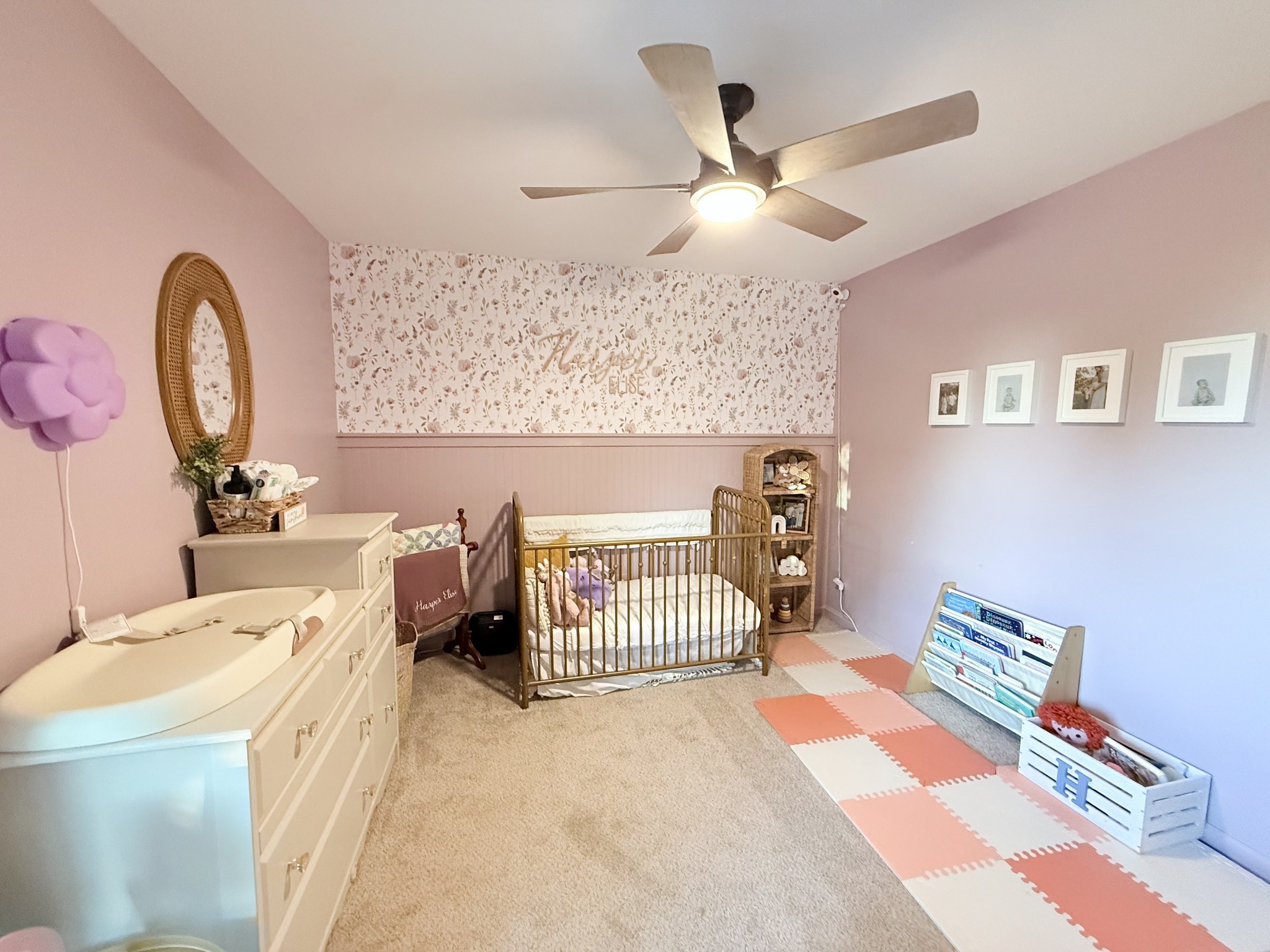 6023 Wayman Dunn Road Springfield, TN 37172 - Photo 32 of 38 a bedroom with a bed and a chandelier