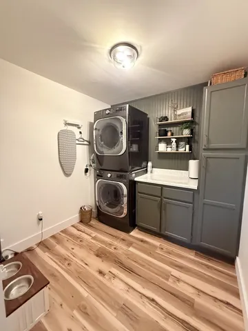 a bedroom with a bed and cabinets