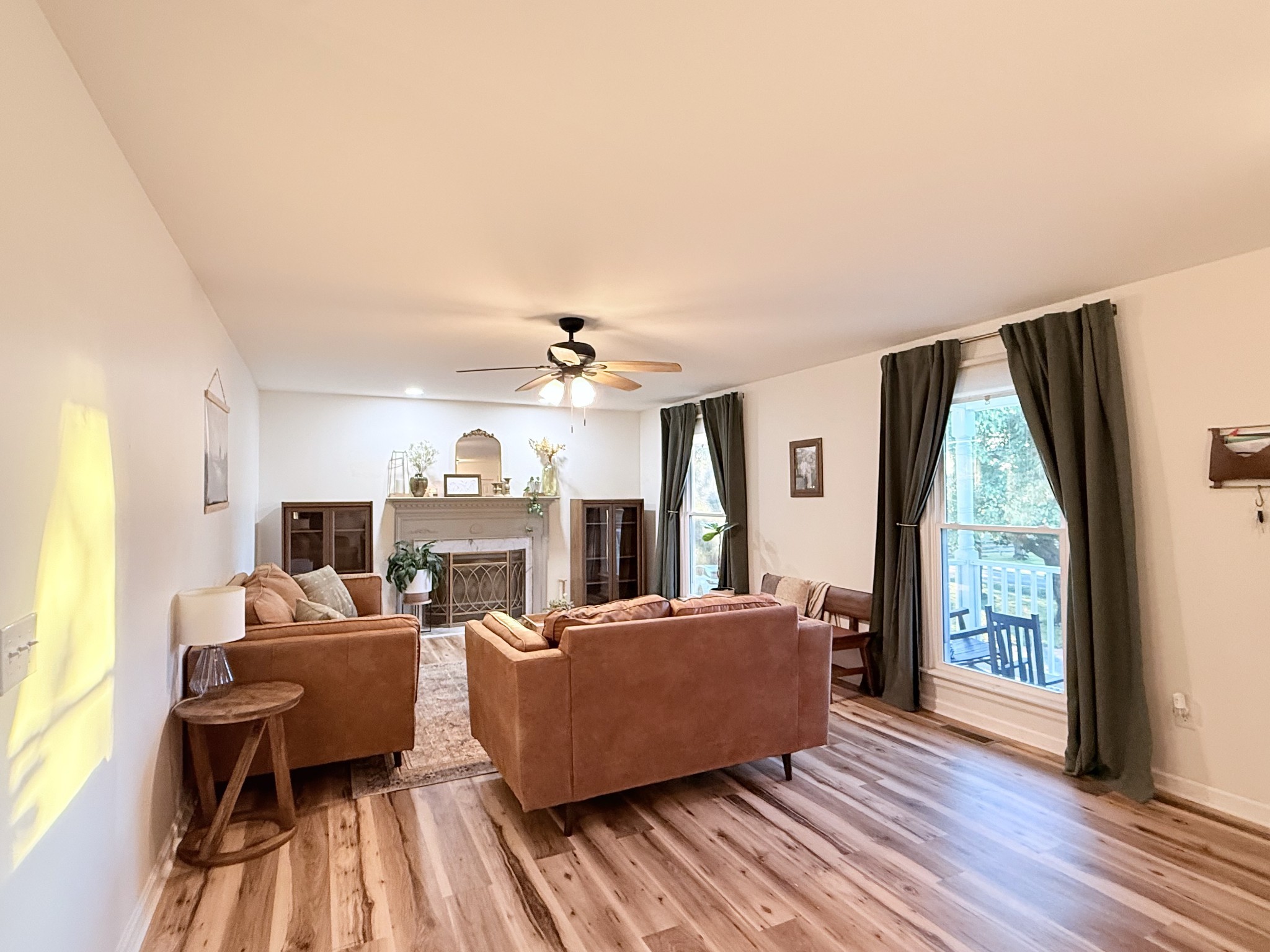 6023 Wayman Dunn Road Springfield, TN 37172 - Photo 8 of 38 a living room with furniture large window and wooden floor