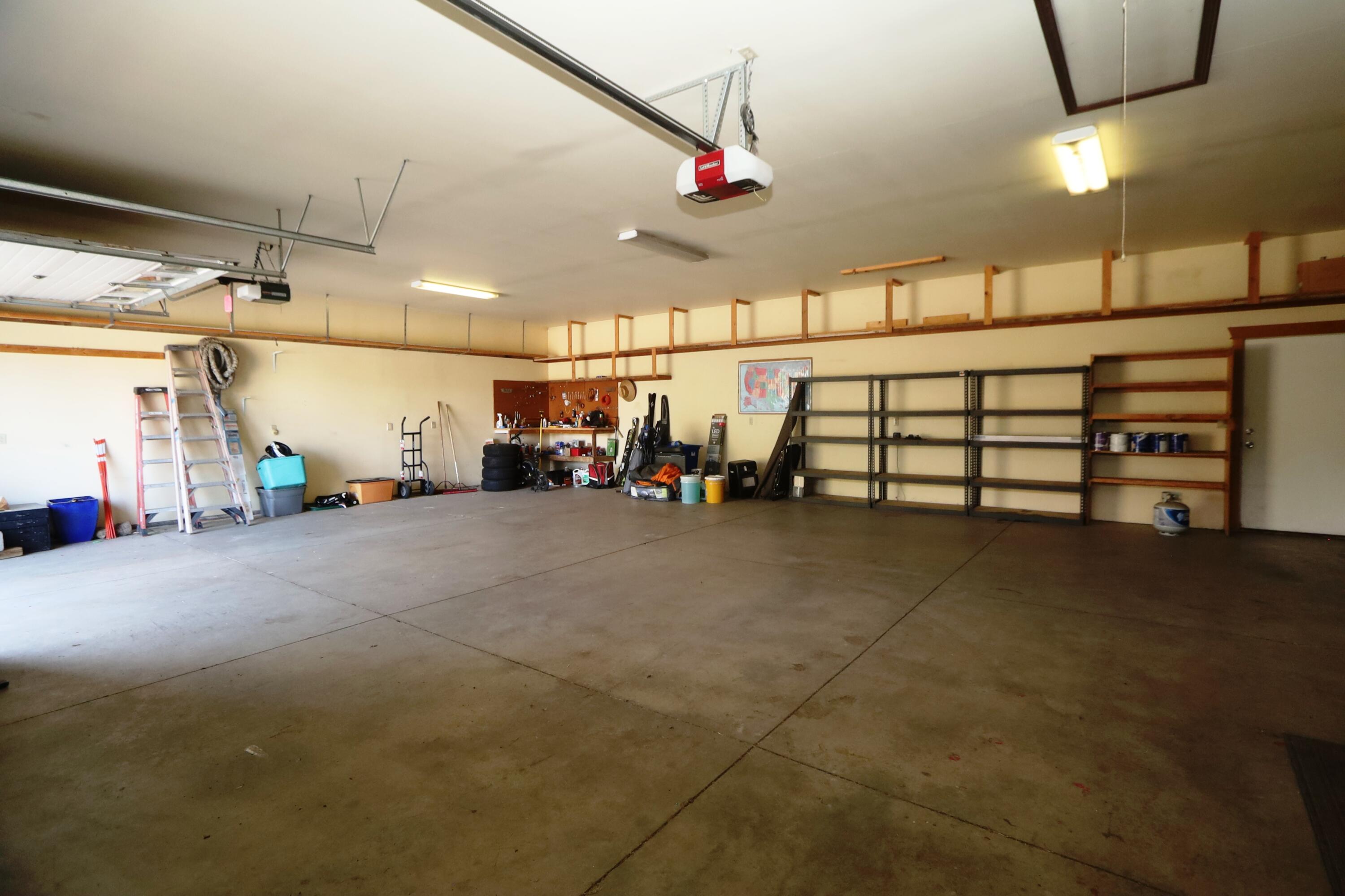 21491 Bear Creek Road Bend, OR 97701 - Photo 25 of 45 a view of a garage with furniture