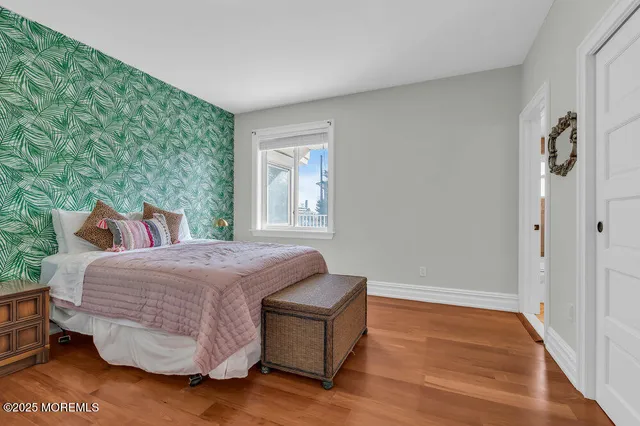 a bathroom with a mirror and a shower