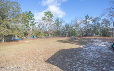 7169 Gas Line Road Keystone Heights, FL 32656 - Photo 5 of 31 a view of dirt field with trees