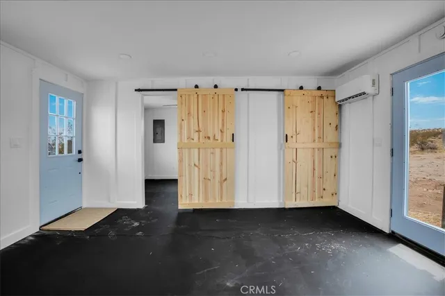 a room with cabinets and window