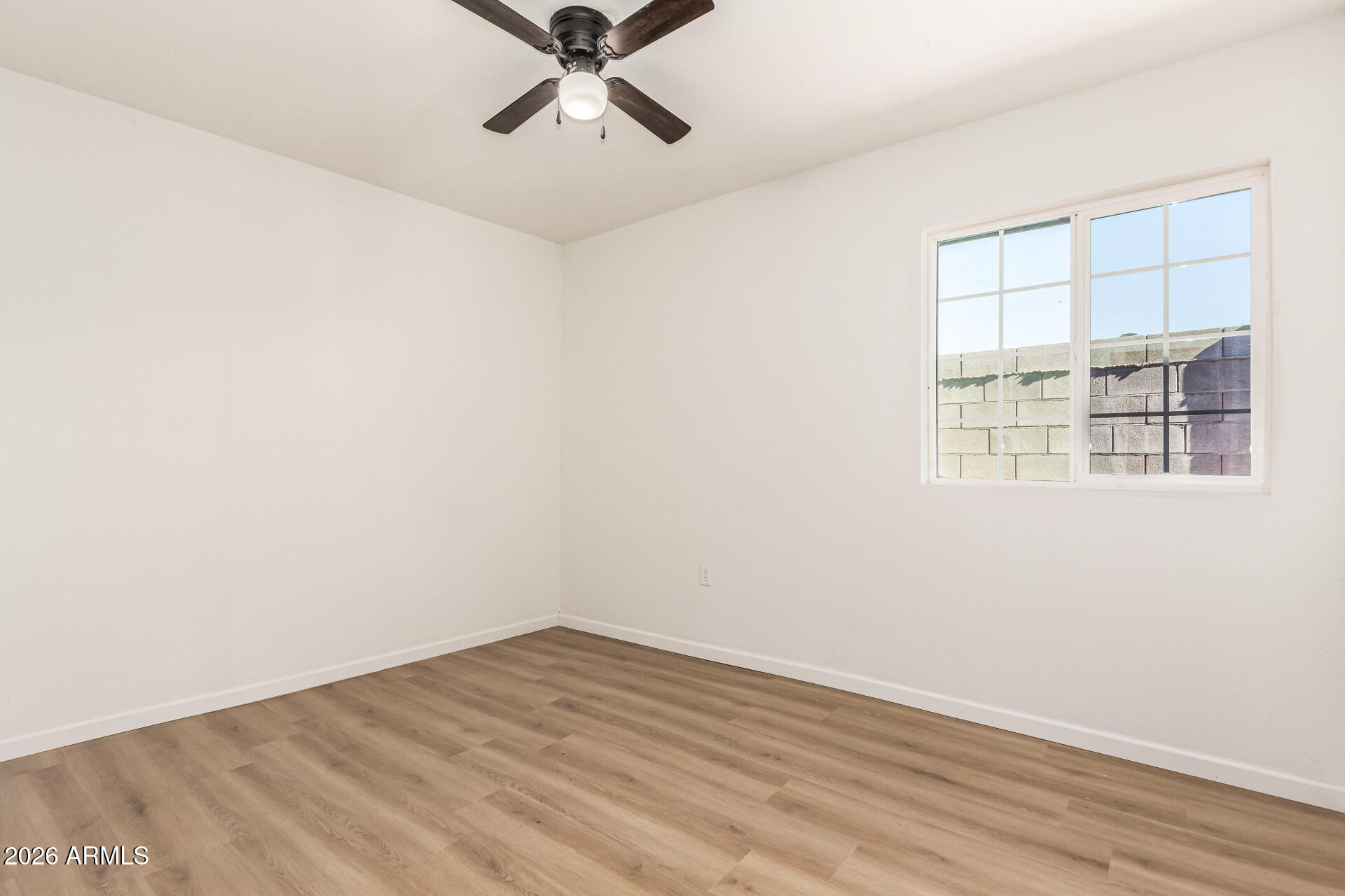 411 West Bealey Avenue Coolidge, AZ 85128 - Photo 16 of 26 an empty room with a window