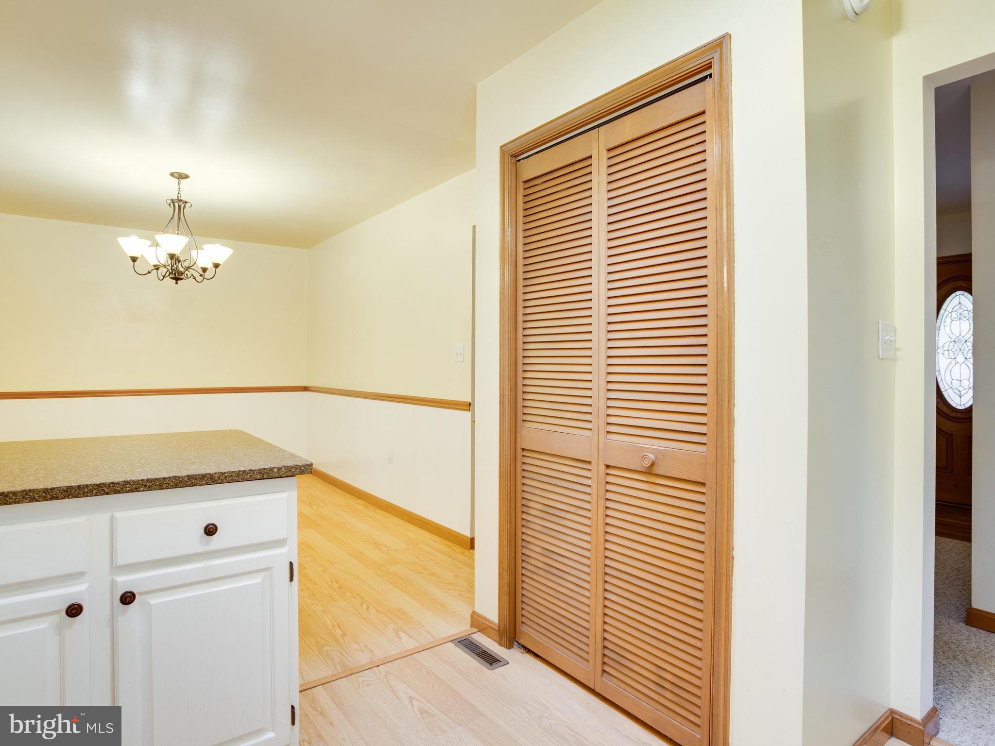 11893 Little Cove Point Road Lusby, MD 20657 - Photo 8 of 18 a view of a hallway with front door