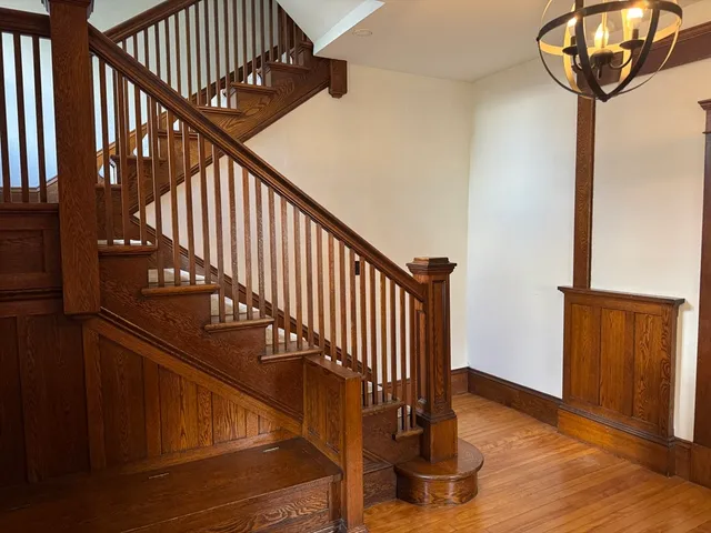 a view of entryway with wooden floor